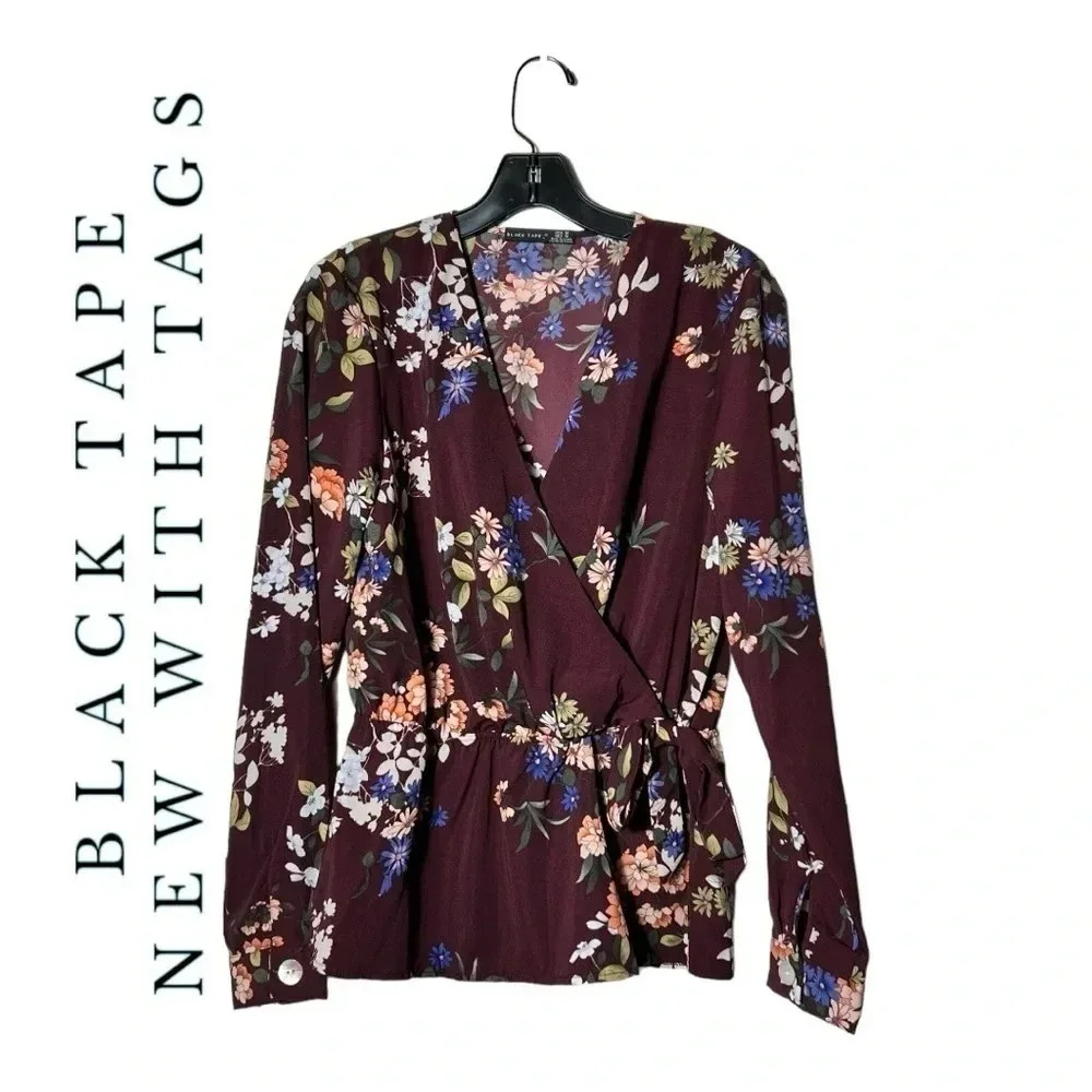 1889. BLACK TAPE FAUX WRAP TOP MAROON WITH FLORAL PATTERN SIZE MEDIUM BOW RUFFLE